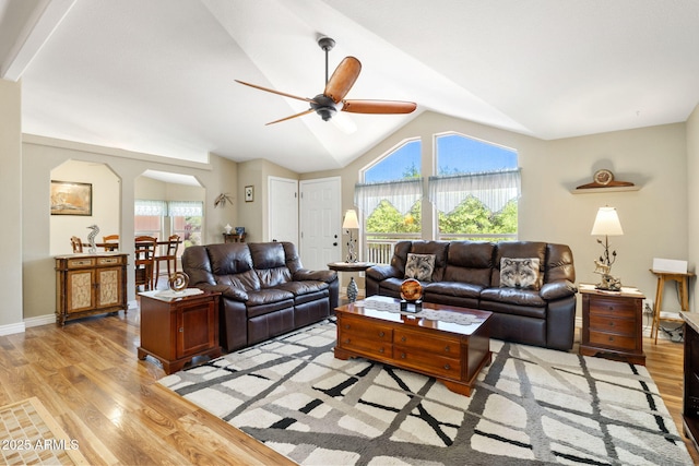 490 S Hideaway Dr, Dewey, AZ 86327 - living area featuring ceiling fan, light wood-style floors, vaulted ceiling, arched walkways, and baseboards