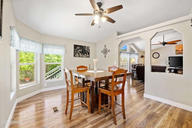 490 S Hideaway Dr, Dewey, AZ 86327 - dining space with a ceiling fan, vaulted ceiling, light wood-style floors, and baseboards