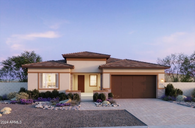 prairie-style home with a garage