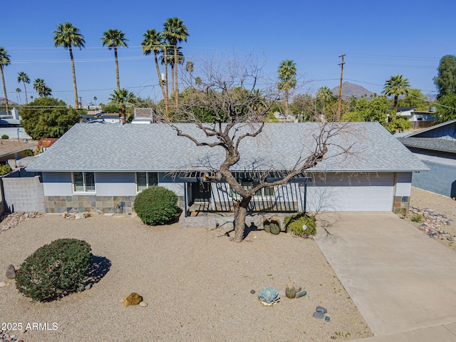 3138 N 82nd Pl, Scottsdale, AZ 85251 - ranch-style house with an attached garage, driveway, fence, and a shingled roof