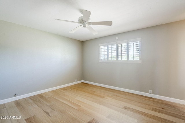 3138 N 82nd Pl, Scottsdale, AZ 85251 - spare room with baseboards, light wood-type flooring, and ceiling fan