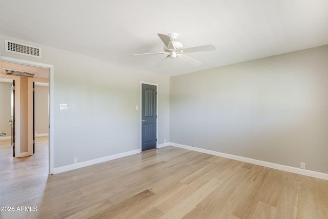 3138 N 82nd Pl, Scottsdale, AZ 85251 - spare room featuring light wood-style floors, baseboards, a ceiling fan, and visible vents