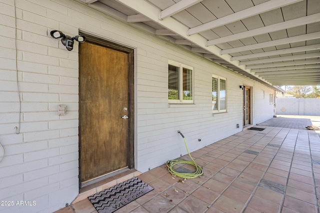3138 N 82nd Pl, Scottsdale, AZ 85251 - doorway to property featuring a patio and fence