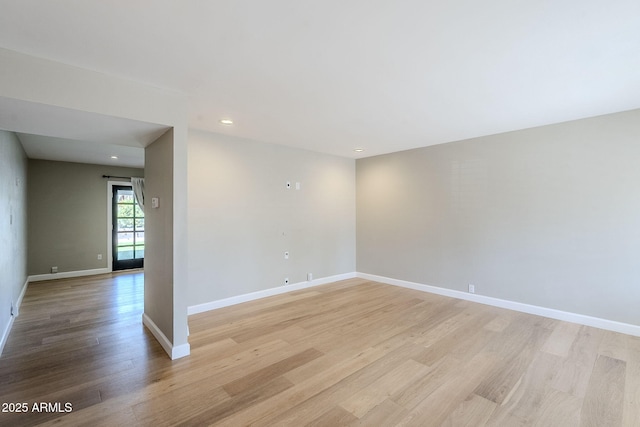 3138 N 82nd Pl, Scottsdale, AZ 85251 - empty room with light wood-style flooring, baseboards, and recessed lighting