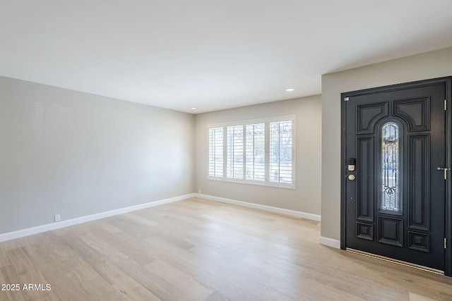 3138 N 82nd Pl, Scottsdale, AZ 85251 - entrance foyer with baseboards and light wood finished floors