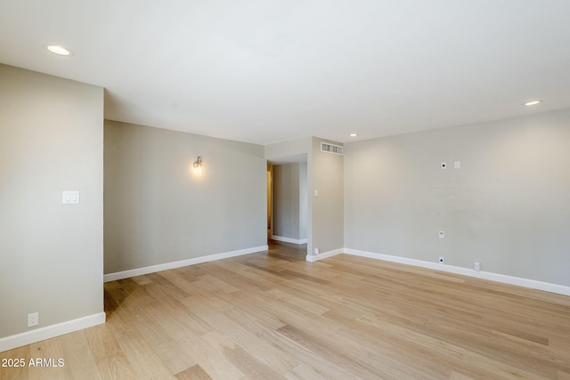 3138 N 82nd Pl, Scottsdale, AZ 85251 - spare room with visible vents, baseboards, recessed lighting, and light wood-style floors