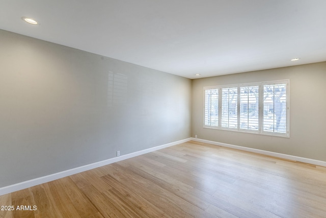 3138 N 82nd Pl, Scottsdale, AZ 85251 - empty room with baseboards, recessed lighting, and light wood-style floors