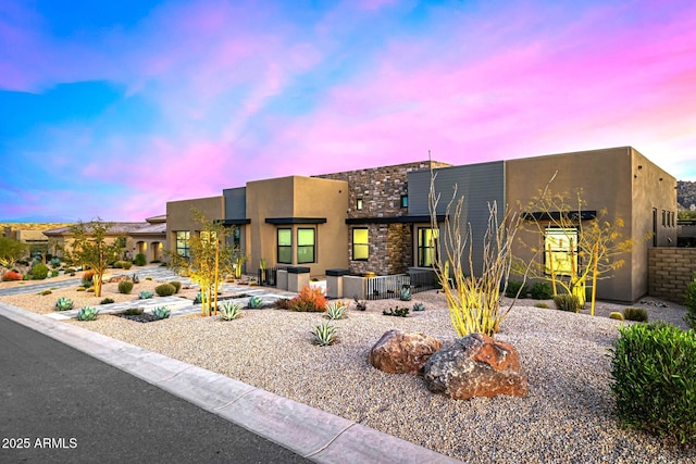 view of front of house with stucco siding