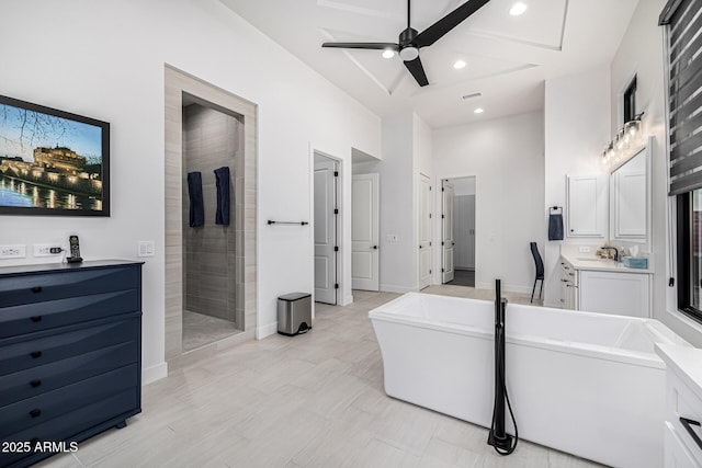 full bath featuring a soaking tub, visible vents, a high ceiling, a tile shower, and vanity