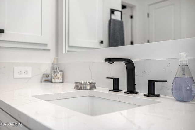 details with backsplash and a sink