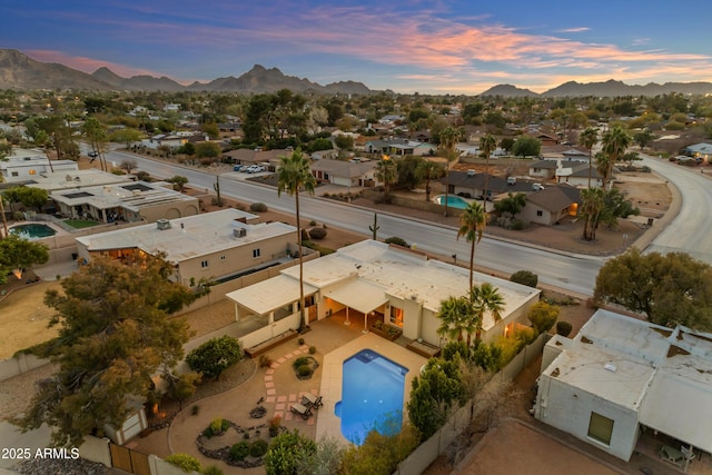 aerial view at dusk with a mountain view