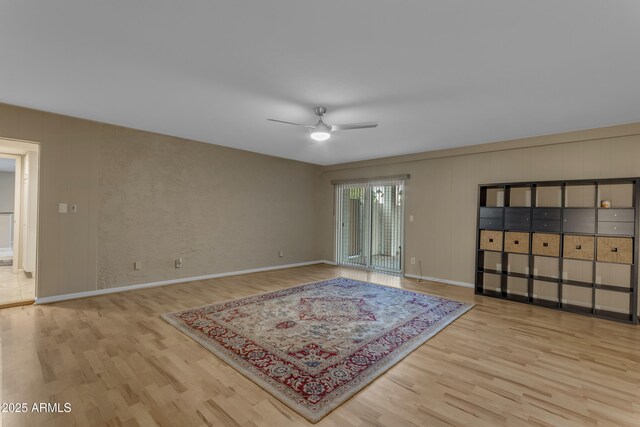 bedroom with ceiling fan and wood-type flooring