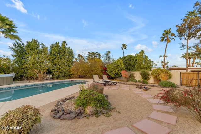 view of swimming pool featuring a patio