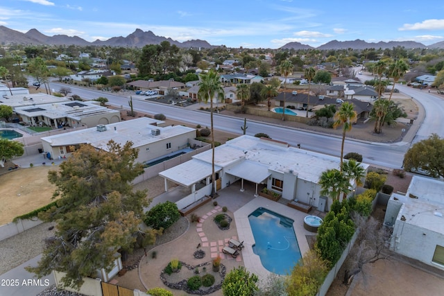 drone / aerial view featuring a mountain view