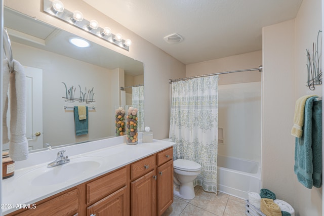 full bathroom featuring tile patterned floors, vanity, toilet, and shower / tub combo