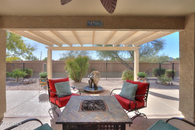 view of patio / terrace featuring a fire pit and a pergola