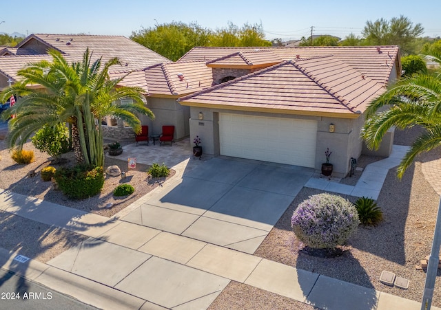 view of front of home with a garage