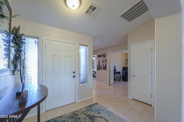 view of tiled entrance foyer