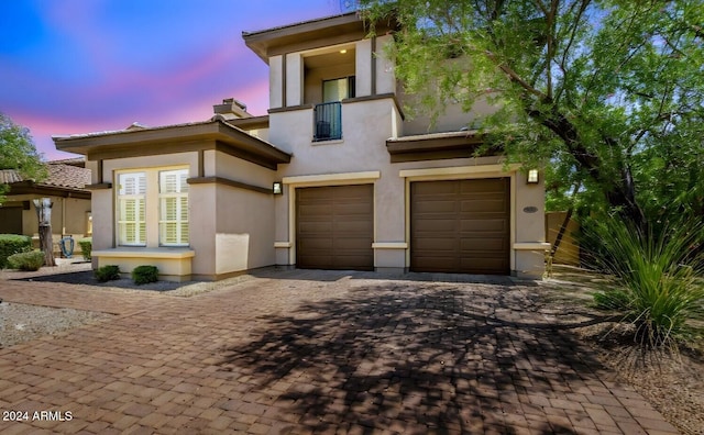 view of front of property featuring a garage