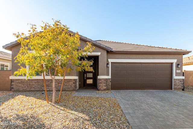 view of front of property with a garage