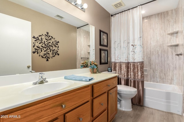 full bathroom featuring hardwood / wood-style flooring, vanity, toilet, and shower / tub combo with curtain