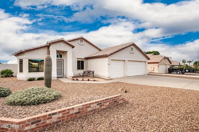 mediterranean / spanish-style house featuring a garage