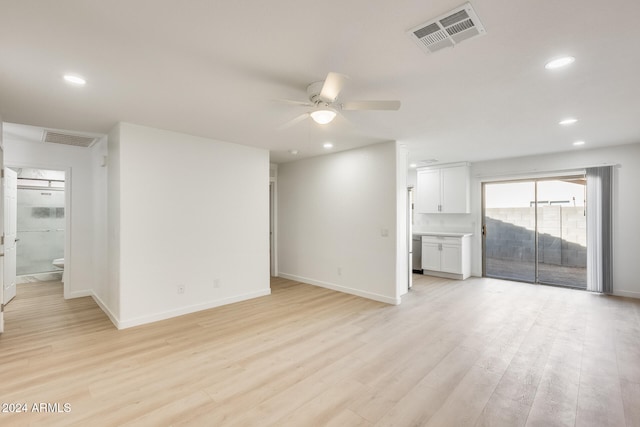 unfurnished living room with light hardwood / wood-style floors and ceiling fan