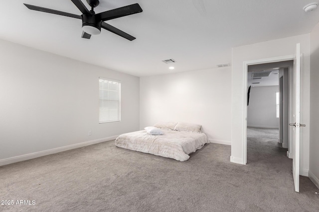 carpeted bedroom with baseboards and ceiling fan