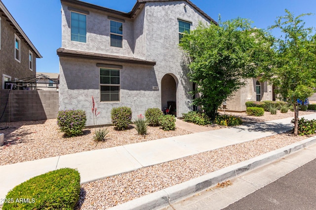 view of front of house featuring stucco siding