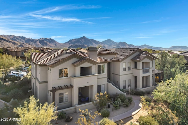 exterior space featuring a mountain view