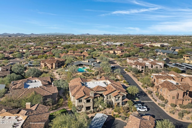 drone / aerial view featuring a mountain view