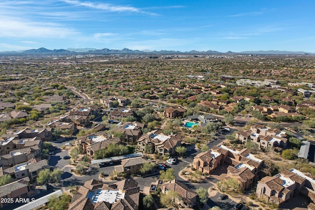 birds eye view of property featuring a mountain view