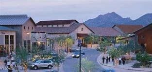 surrounding community featuring a mountain view