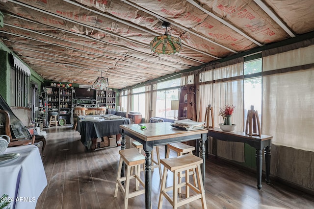 dining area featuring dark hardwood / wood-style flooring