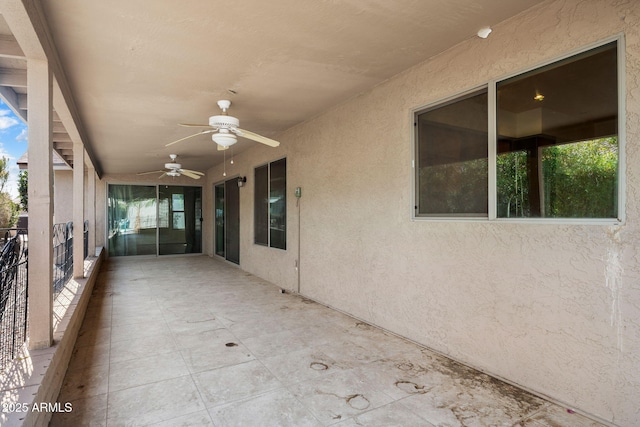 view of patio with ceiling fan