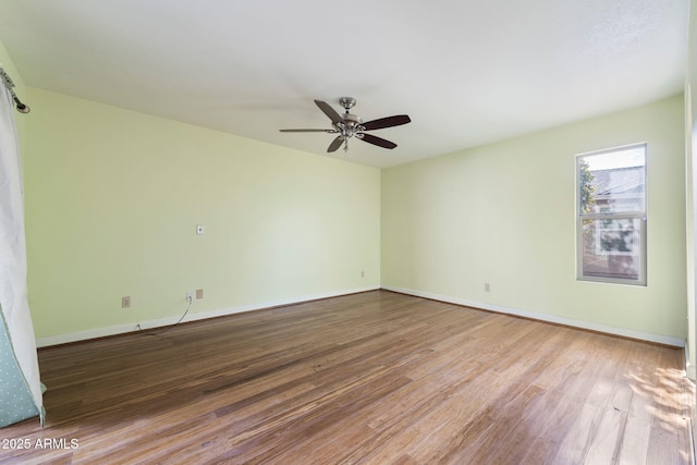 unfurnished room featuring wood-type flooring and ceiling fan