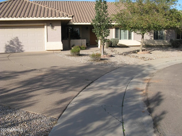 view of front of home with a garage