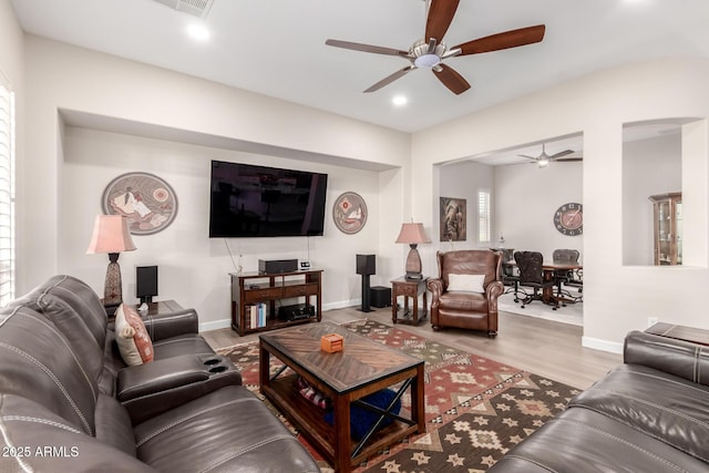 living room with recessed lighting, baseboards, wood finished floors, and ceiling fan