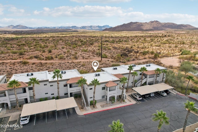 aerial view with view of desert and a mountain view