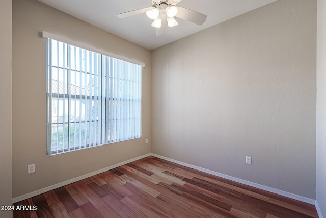 14950 W Mountain View Blvd Unit 1310, Surprise, AZ 85374 - empty room with wood finished floors, ceiling fan, and baseboards