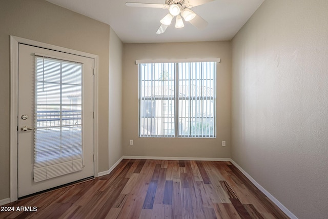 14950 W Mountain View Blvd Unit 1310, Surprise, AZ 85374 - doorway with wood finished floors, plenty of natural light, baseboards, and a ceiling fan