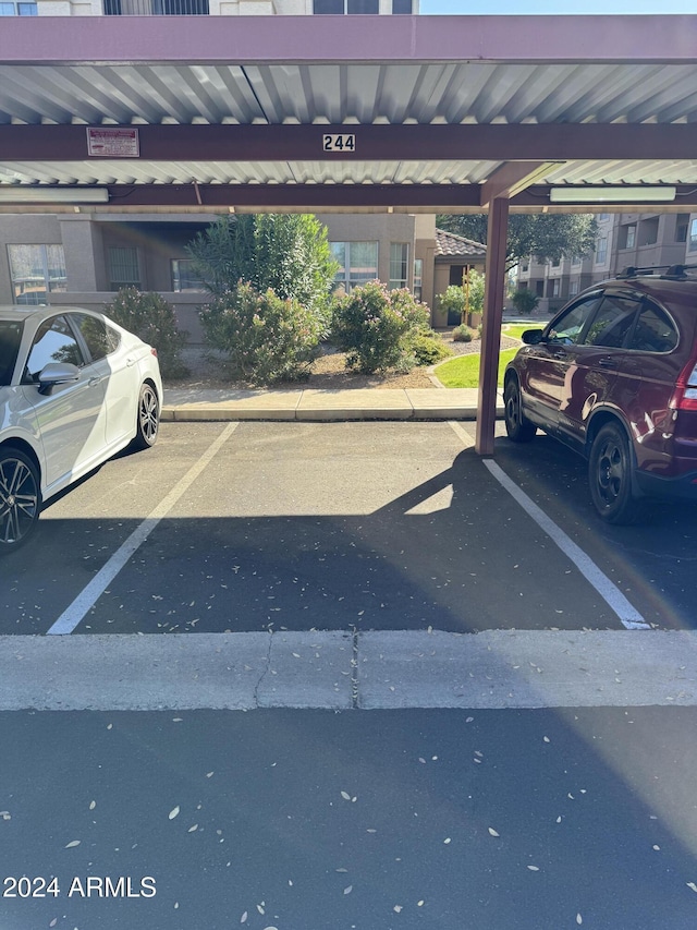 view of car parking with a carport