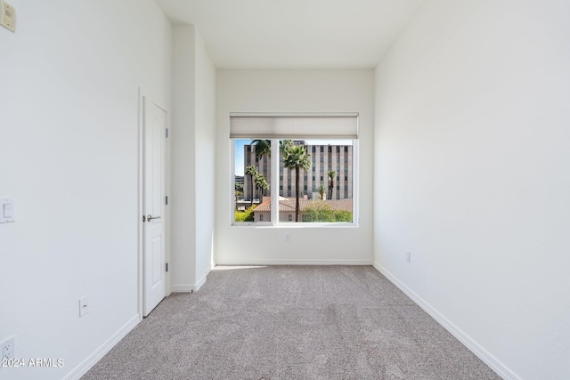 unfurnished room with carpet floors