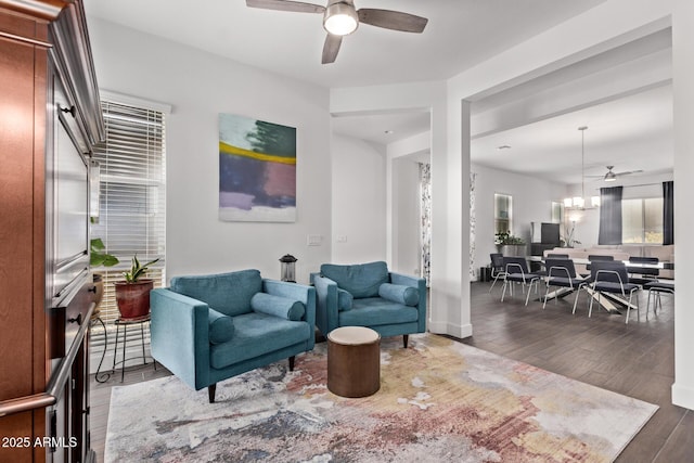 939 E Paseo Way, Phoenix, AZ 85042 - living area with ceiling fan, wood finished floors, and baseboards