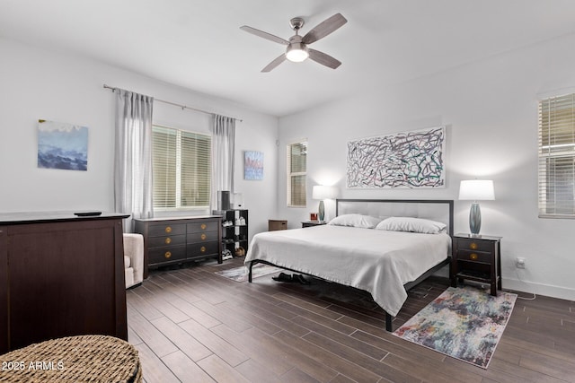 939 E Paseo Way, Phoenix, AZ 85042 - bedroom featuring wood finished floors, baseboards, and ceiling fan