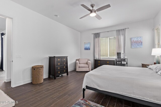 939 E Paseo Way, Phoenix, AZ 85042 - bedroom featuring dark wood-style floors, baseboards, and a ceiling fan