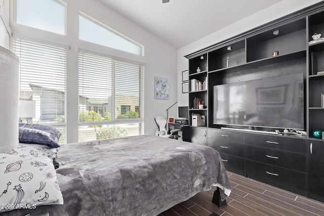 939 E Paseo Way, Phoenix, AZ 85042 - bedroom with dark wood-style floors and lofted ceiling