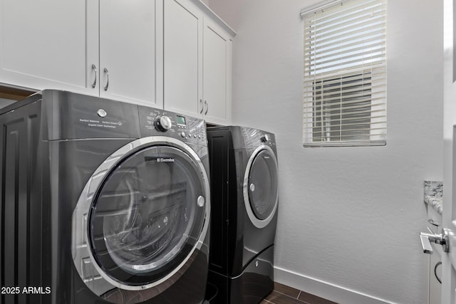 939 E Paseo Way, Phoenix, AZ 85042 - laundry room featuring cabinet space, washer and dryer, dark wood-type flooring, and baseboards
