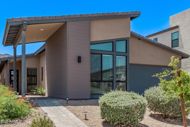 939 E Paseo Way, Phoenix, AZ 85042 - doorway to property with stucco siding