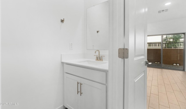 bathroom featuring visible vents and vanity